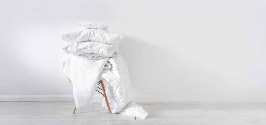 Dekbed wassen: hoeveel graden, welk programma en meer Dekbed wassen: hoeveel graden, welk programma en meer