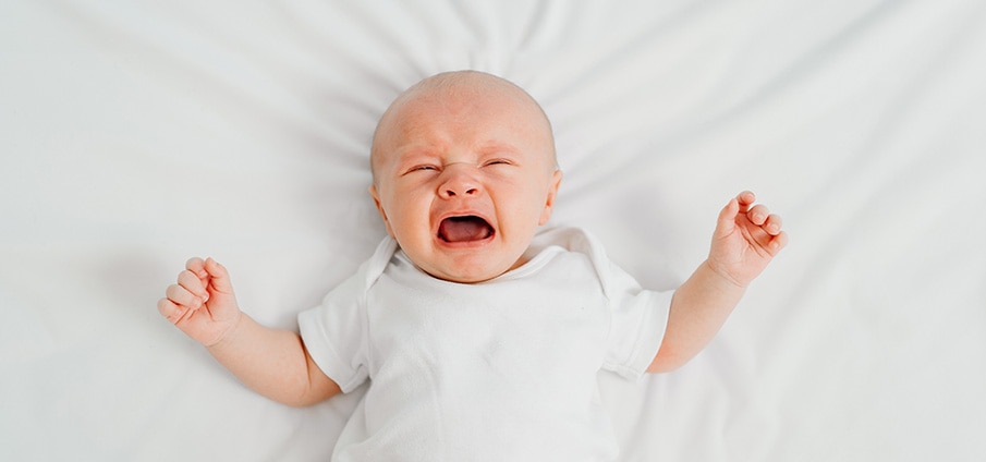 Huilbaby: definitie, oorzaak en wat kan je doen?